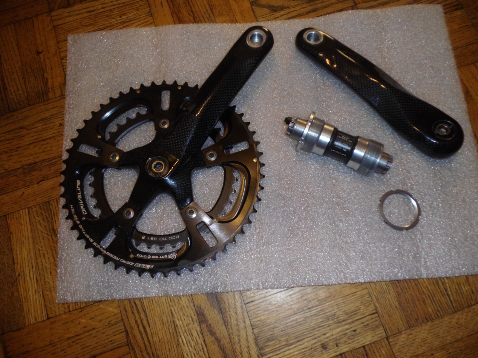 road bike carbon crankset and Dura Ace BB-7700 sealed cartridge bottom bracket