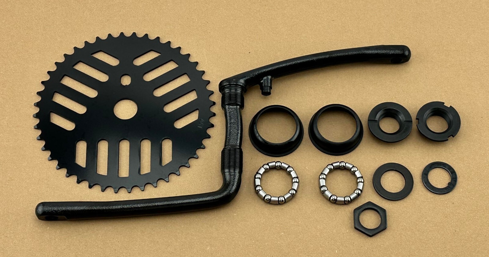 BLACK GT STYLE BICYCLE 44T SPROCKET, 6 1/2 BLACK CRANK, & BOTTOM BRACKET SET.