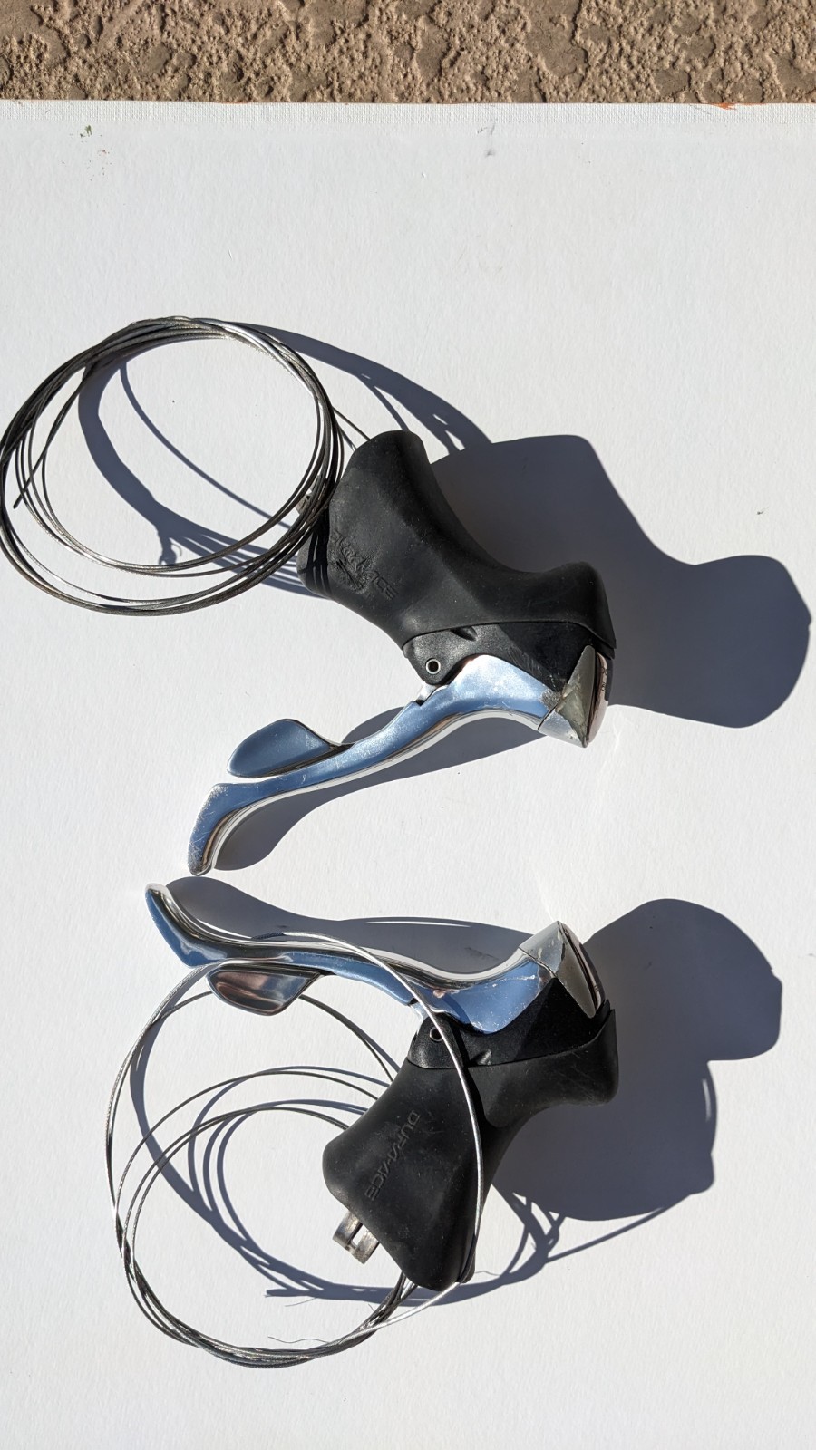 Shimano Dura-Ace ST-7700-C; 2 x 9 STI Shifters/Brifters