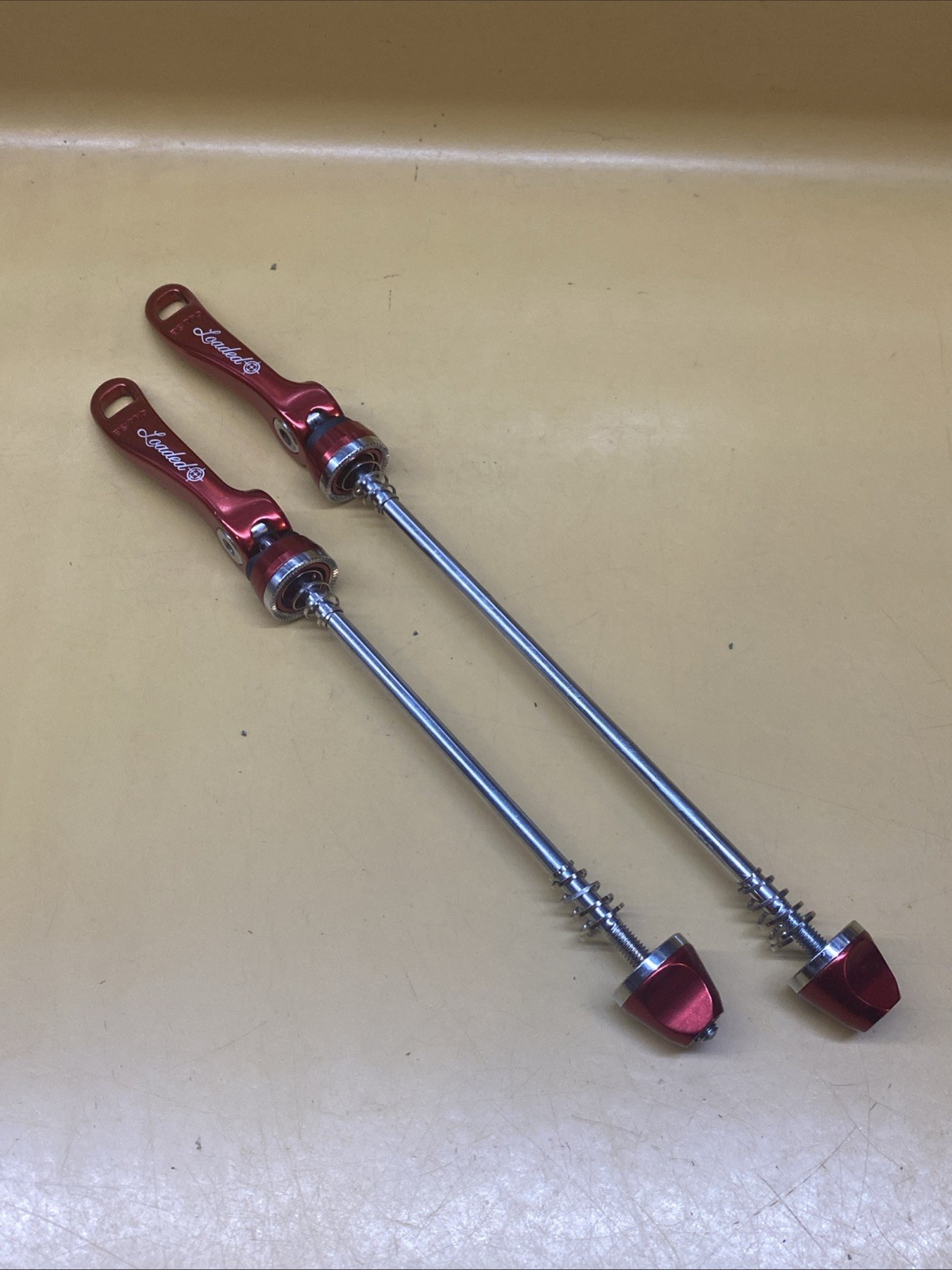 Red Loaded Front 100mm / Rear 135mm Steel Quick Release Skewer Set