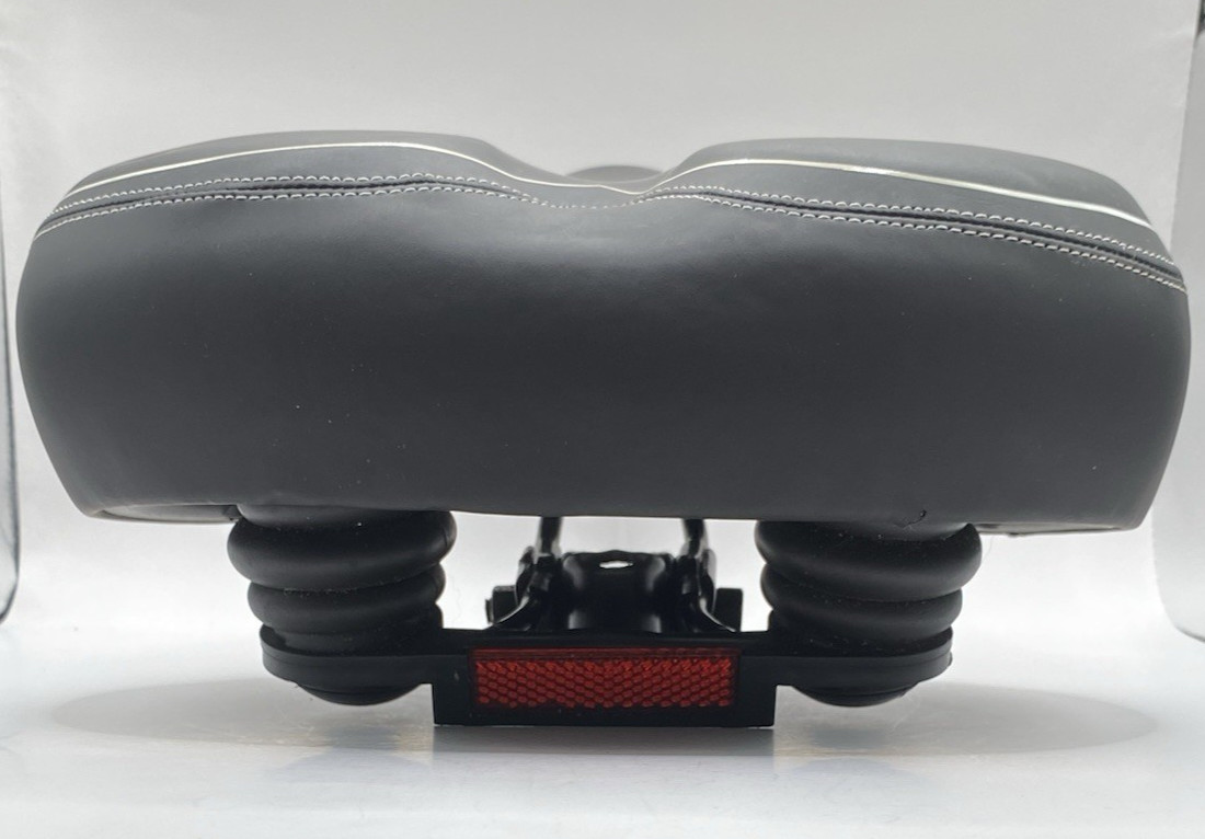 WUVOP black oversized bike seat with a white reflective strip
