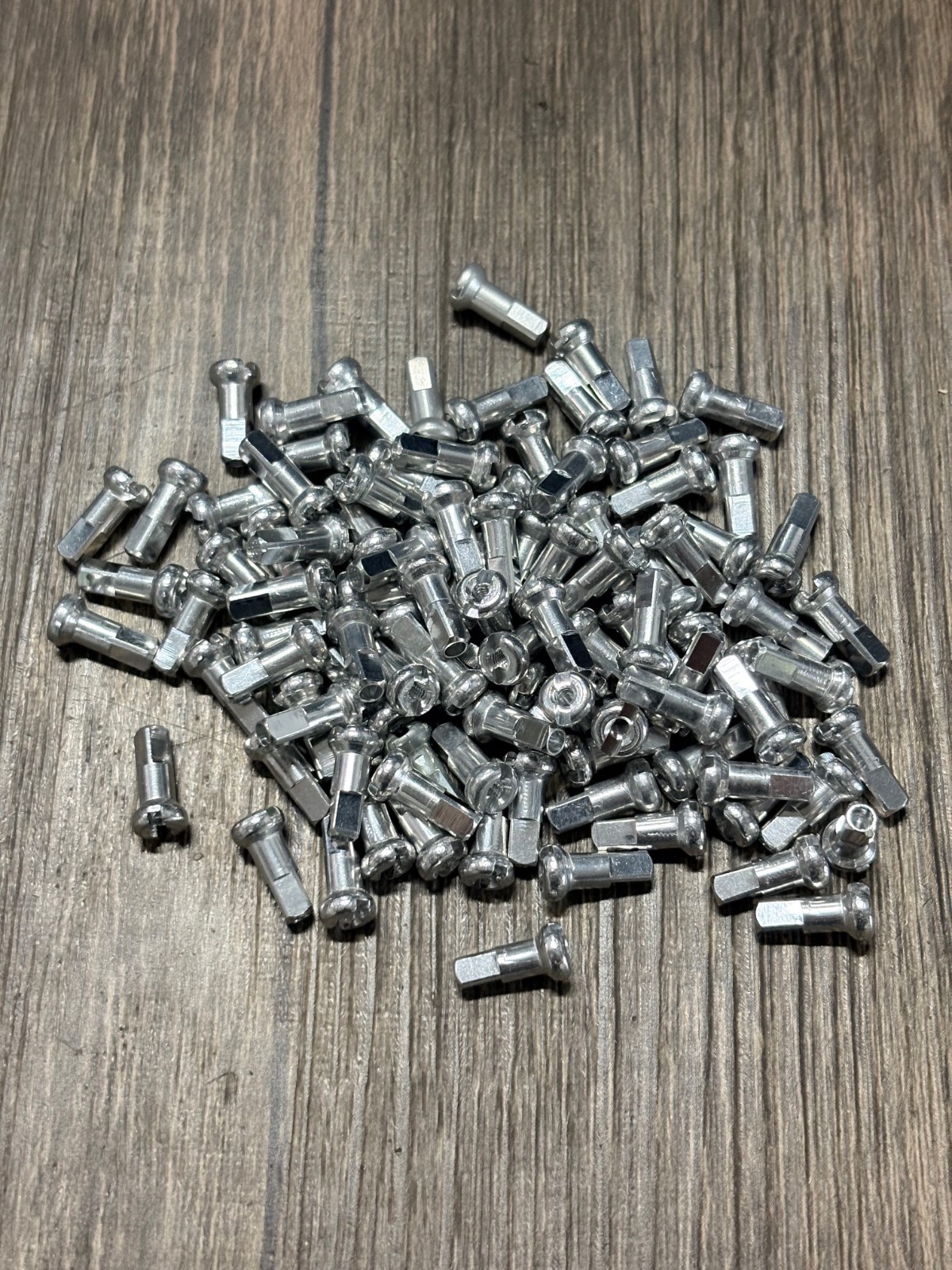 DT Swiss 2.0mm Standard Alloy / Aluminum Nipples 2.0 x 12mm Silver 82 Count