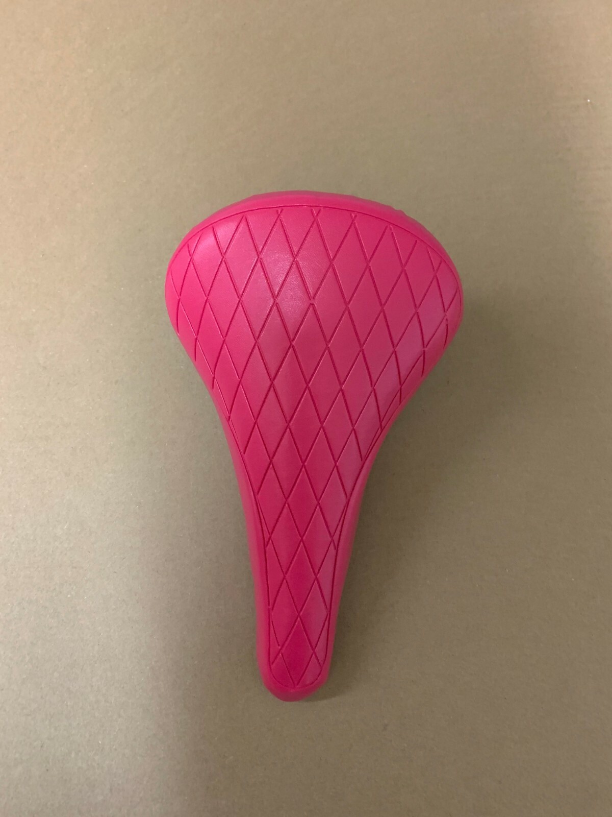 NEW! ABSOLUTE UNIVERSAL BMX BICYCLE VINYL SADDLE IN DIAMOND STYLE IN PINK.