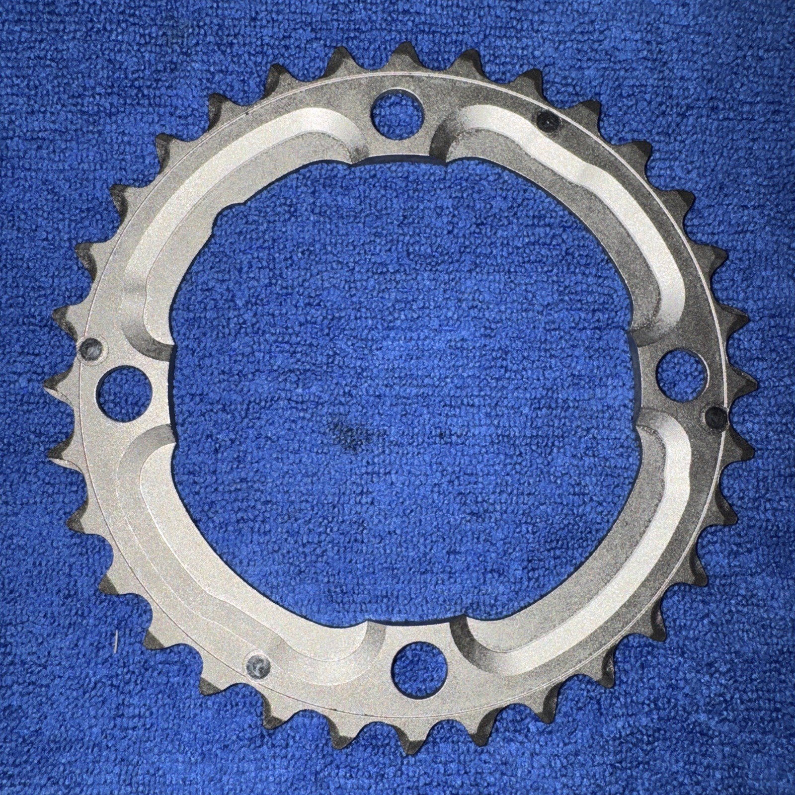 UNBRANDED MTN CHAINRING 104MM BCD 32T MIDDLE W/RAMPS/PINS NICKEL NEW W/O PACKAGE