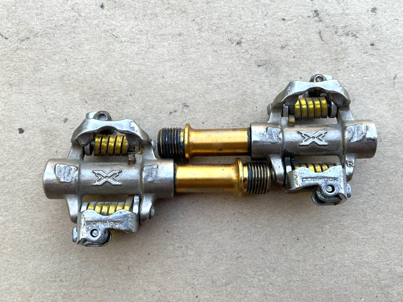 Xpedo “posi-lock” clipless pedals Silver/Gold