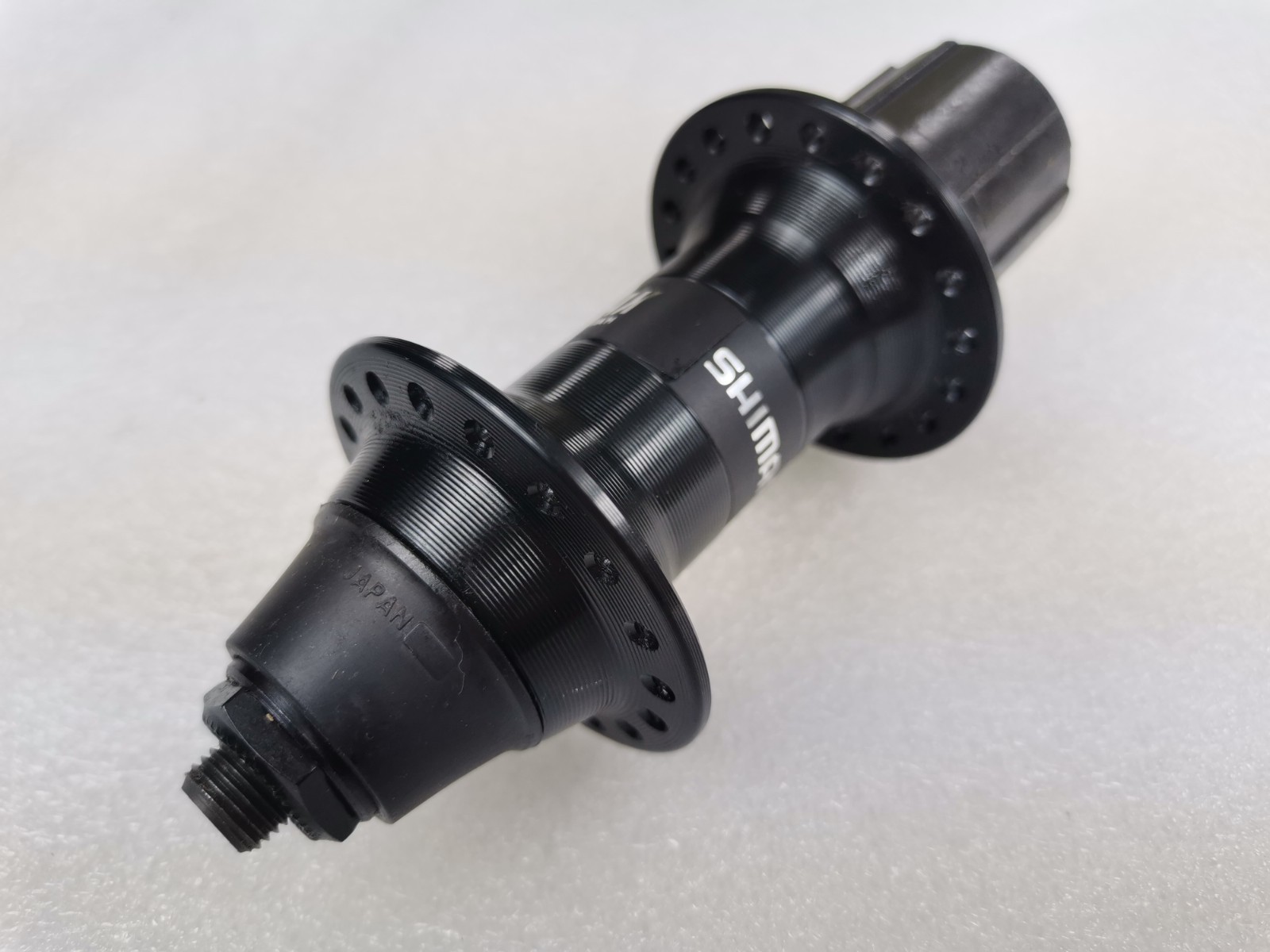SHIMANO FH-RM60 RIM BRAKE REAR HUB TOURING GRAVEL 36 HOLE 135MM QR 8-9-10 SPEED
